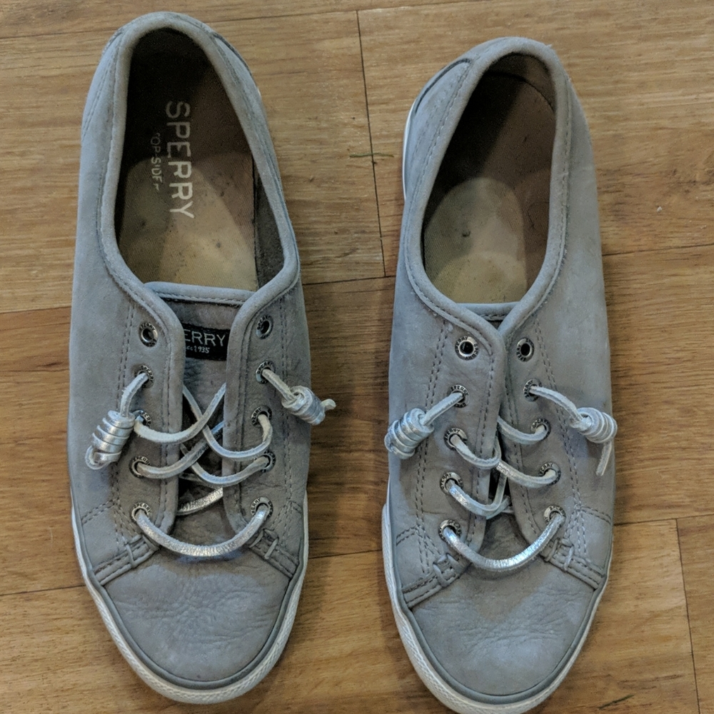 Gray sperry boat shoes with metallic laces